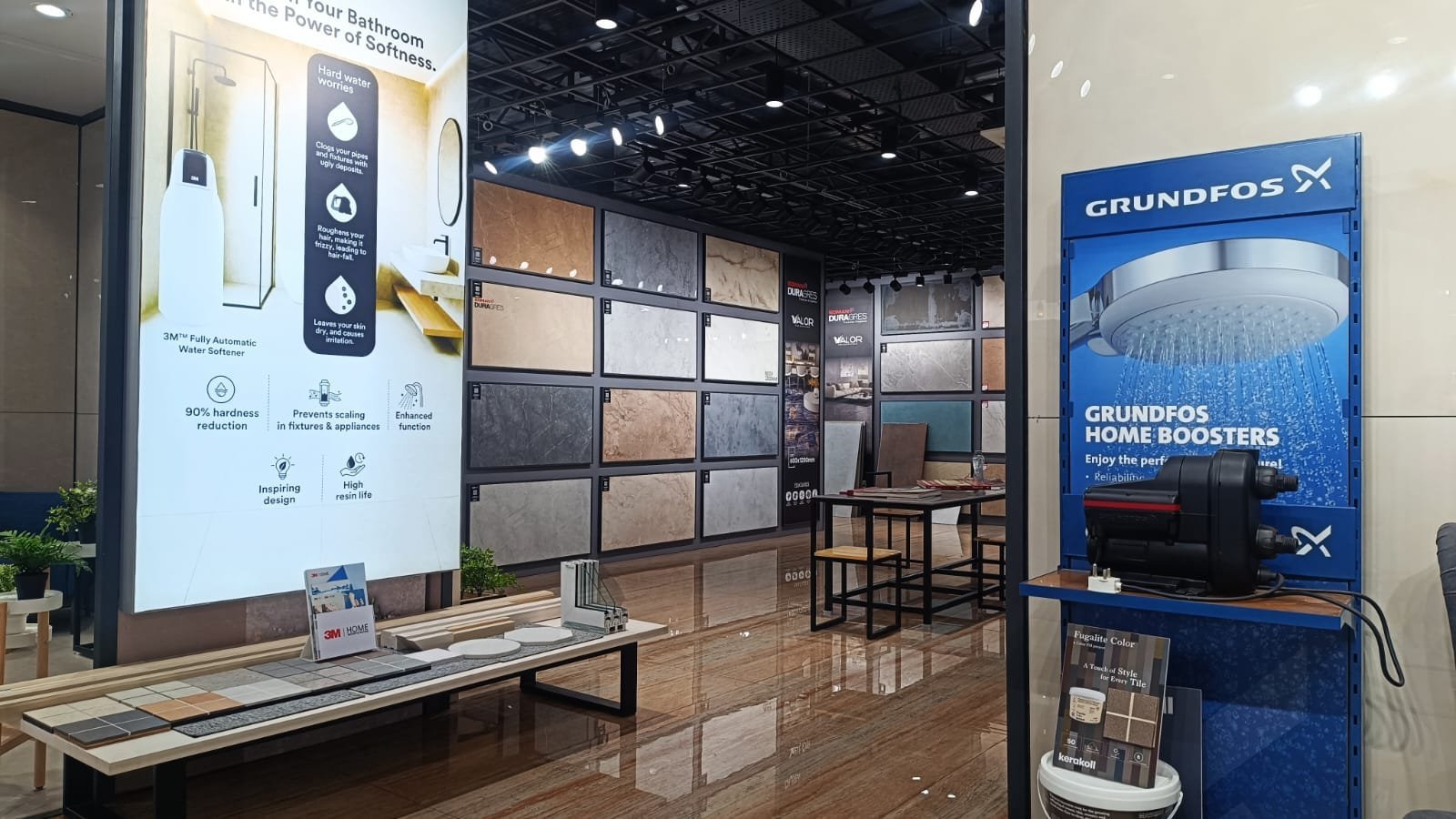 Tile display wall with Grundfos pumps and 3M water solutions section