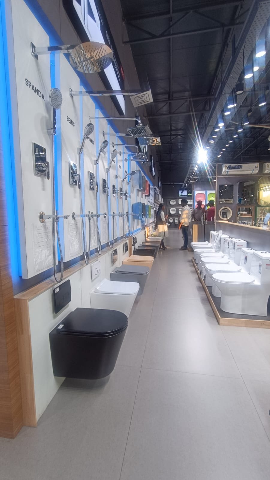 Wall-hung and floor-mounted water closets display aisle